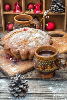 Baked homemade dessert for Christmas in the background decorations.Photo tinted.Selective focus