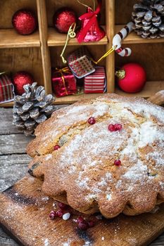 Baked homemade dessert for Christmas in the background decorations.Photo tinted.Selective focus