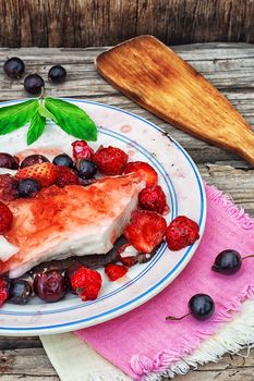 curd jelly cake with strawberries,raspberries and black currants.
