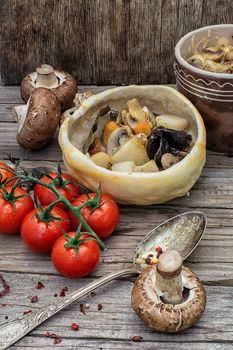 vegetable hot plate made of baked dough cooked in  rustic style.Photo tinted