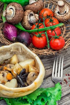 vegetable hot plate made of baked dough cooked in  rustic style.Photo tinted