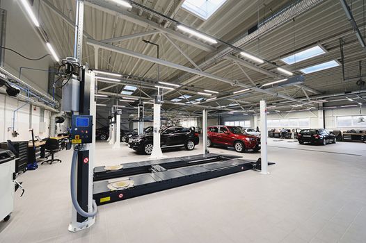 Lifting car equipment in big and clean garage
