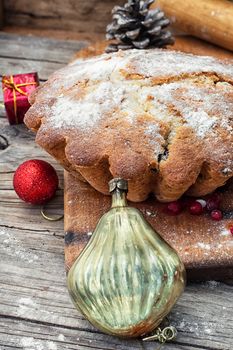 Baked homemade dessert for Christmas in the background decorations.Photo tinted.Selective focus