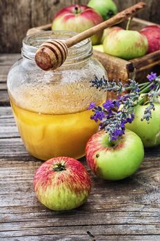 Still life from the harvest of ripe apples and honey to the Church celebration of the apple feast day.Photo tinted.Selective focus