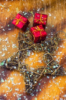 Festive Christmas decorations on wooden background in vintage style.Photo tinted.