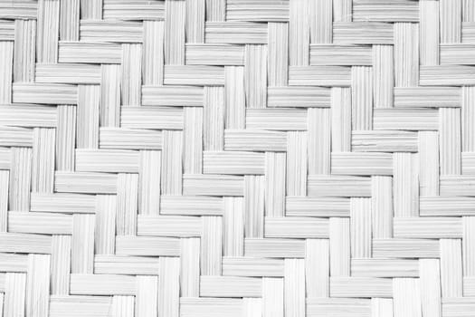 Texture of handmade basket in black and white color . made from bamboo . use for background