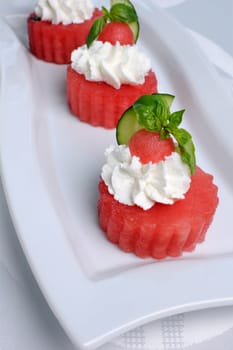 Chilledwatermelon appetizer with ricotta and basil