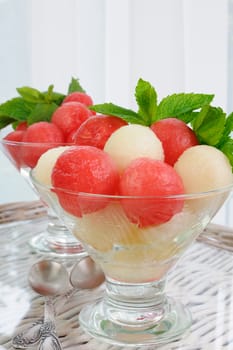 A refreshing snack of watermelon melon balls with mint