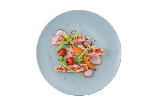Roasted duck breast in modern cuisine style with vegetable and herbs isolated on white background with clipping path