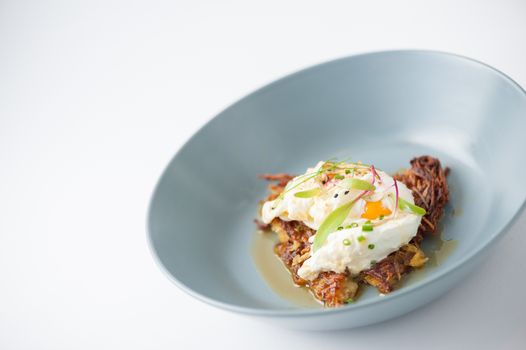 Hash brown with Halloumi cheese and savory dressing