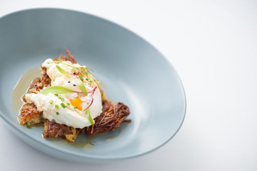 Hash brown with Halloumi cheese and savory dressing