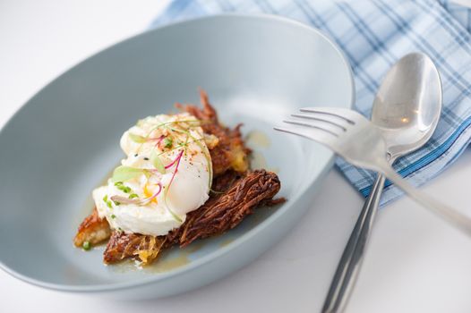Hash brown with Halloumi cheese and savory dressing