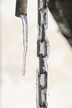 Chain Covered in Ice with an Icicle to the side.