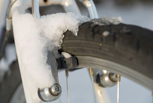 Mountain Bike Brake covered in snow.