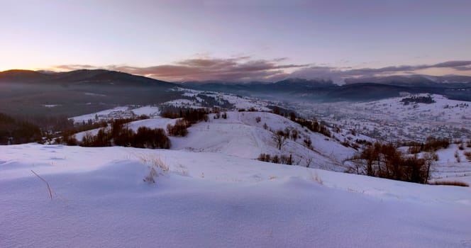 Majestic winter landscape glowing by sunlight in the morning. Dramatic wintry scene. Location Carpathian, Ukraine, Europe. 