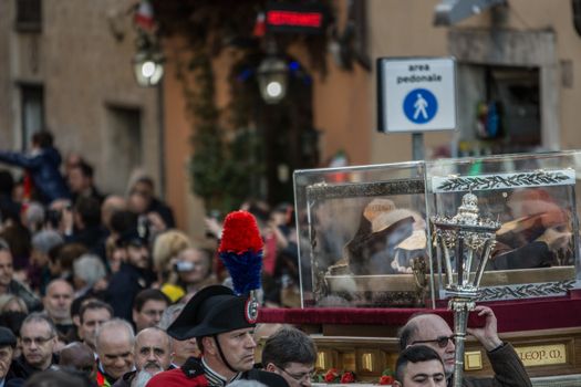 ITALY, Rome: [Warning: graphic content] An estimated 20,000 people march in a procession carrying the body of Padre Pio (in glass at right) through Rome, Italy on February 5, 2016, as Pope Francis' Extraordinary Jubilee of Mercy continues. The procession honors Padre Pio and St. Leopold Mandic, as their bodies are carried from the church of San Salvatore in Lauro, to St. Peter's Basilica at the Vatican. Padre Pio's body arrived in Rome for the first time this week, where it will remain until next week for a series of Masses, vigils, and events at a number of Roman churches.
