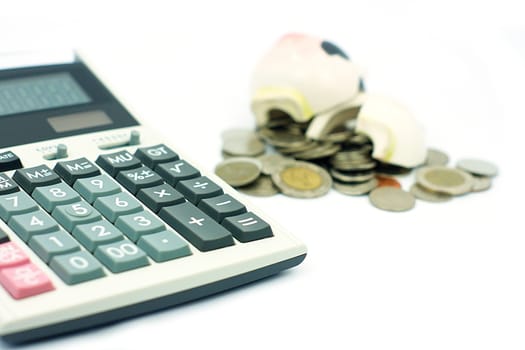 Thai stack coins in financial concept on white background, broken piggy bank put on stack coins