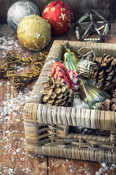Wicker wooden box with old-fashioned Christmas toys