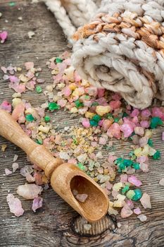 scattered, sea salt Spa treatment on wooden background