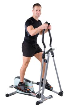 young cute sporty woman doing exercises with elliptical trainer, on white background