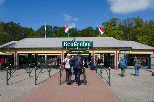 Lisse, Netherlands - May 7, 2015: Tourists at the Entrance into the Keukenhof Garden on May 7, 2015. Keukenhof is the most beautiful spring garden in the world.