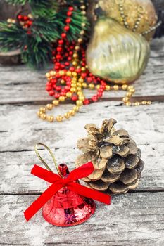 pine cones on the background of snow-covered Christmas ornaments