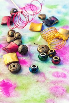 Beads,thread,wire and tools for needlework in  variety of styles
