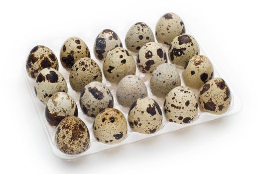Pack of twenty diet quail eggs on white
