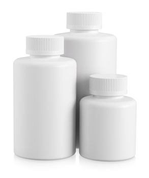 Three white plastic bottles with copy space on white background