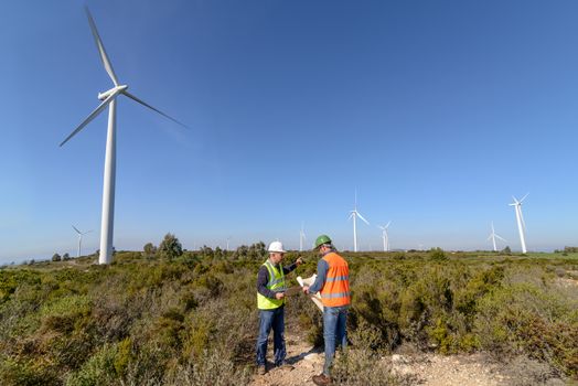 Engineers of wind turbine control projects and production.