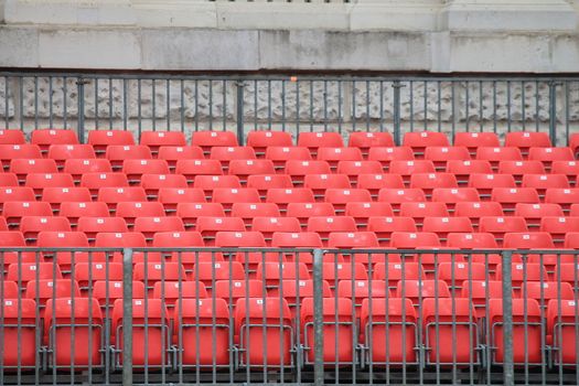 Empty red seats in stadium