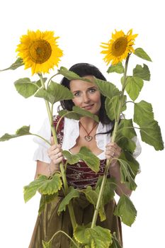 bavarian woman with sunflowers