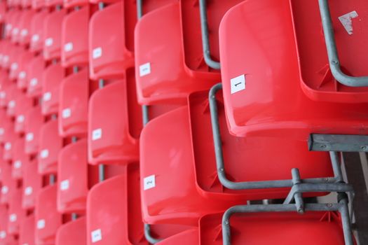 Empty red seats in stadium