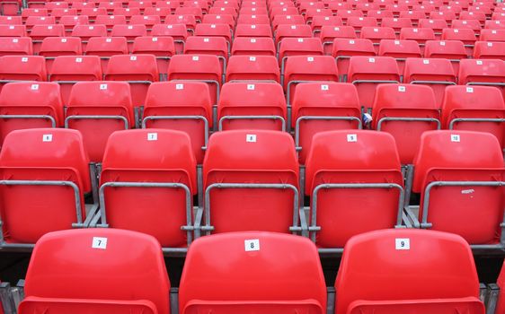 Empty red seats in stadium