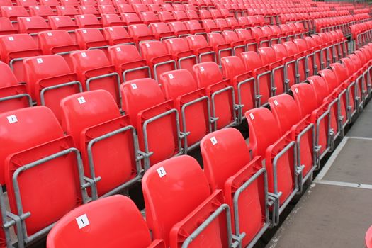 Empty red seats in stadium