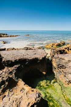 Rock formations on the beach at Ricketts Point, Melbourne, Australia.