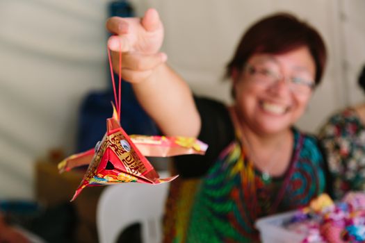 MELBOURNE/AUSTRALIA - FEBRUARY 6: Asian women displaying her Chinese Paper Lantern at the Chinese New Year Celebrations in Melbourne.