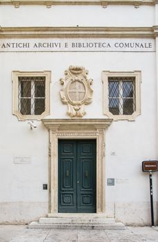 Facade and entrance door of the municipal library of Verona.