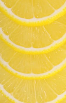 The fresh lemon as a background closeup