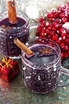 Crystal goblet with mulled wine and cinnamon stick in it,decorated with star anise
