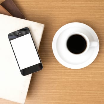 coffee cup and phone and stack of book on wood background
