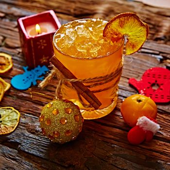 cocktail of ripe mandarins in glass. selective focus