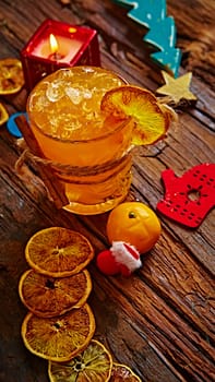 cocktail of ripe mandarins in glass. selective focus