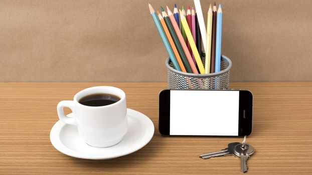 coffee,phone,key and pencil on wood table background