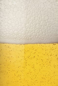 Close up of beer pearls, adding up to froth