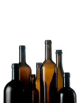 Set of empty wine bottles isolated on white backround. Shallow DOF.
