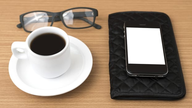 coffee,phone,eyeglasses and wallet on wood table background