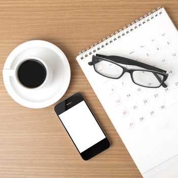 coffee,phone,eyeglasses and calendar on wood table background