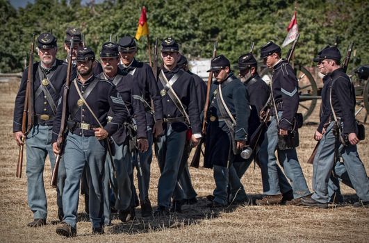 Anderson, California, United States-September 27, 2014: Members of the Union's 72nd New York get ready during a Civil War reenactment.