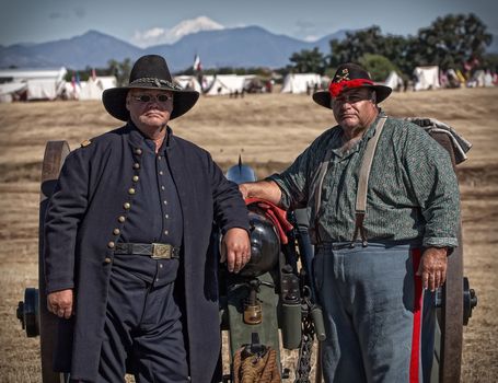 A Union Army cannon crew at a Civil War reenactment in Anderson, California. Mt. Shasta is in the distance.
Photo taken on: September 27th, 2014